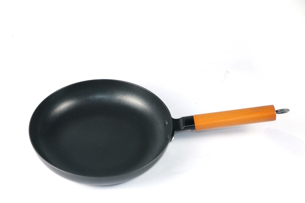 Seasoning a Carbon Steel Pan Is a Hand Job, Not an Oven Job - hands & tools